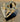 VARIEGATED GOLD SABRE TOOTH TIGER SKULL WITH PEARL ENCRUSTED TEETH