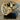 VARIEGATED GOLD SABRE TOOTH TIGER SKULL WITH PEARL ENCRUSTED TEETH