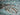 IRIDESCENT SILVER FISH SHOAL ON BRONZE WALL PANEL BY DANIEL LAURENCE